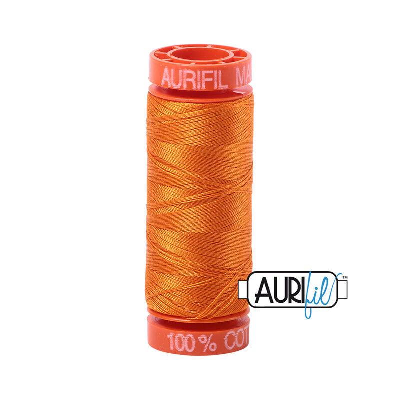Bright Orange thread on an orange spool, isolated on a white background
