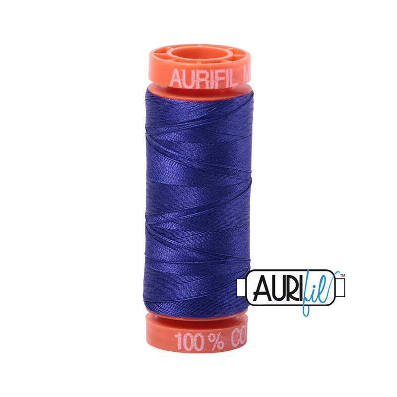 Blue Violet thread on an orange spool, isolated on a white background
