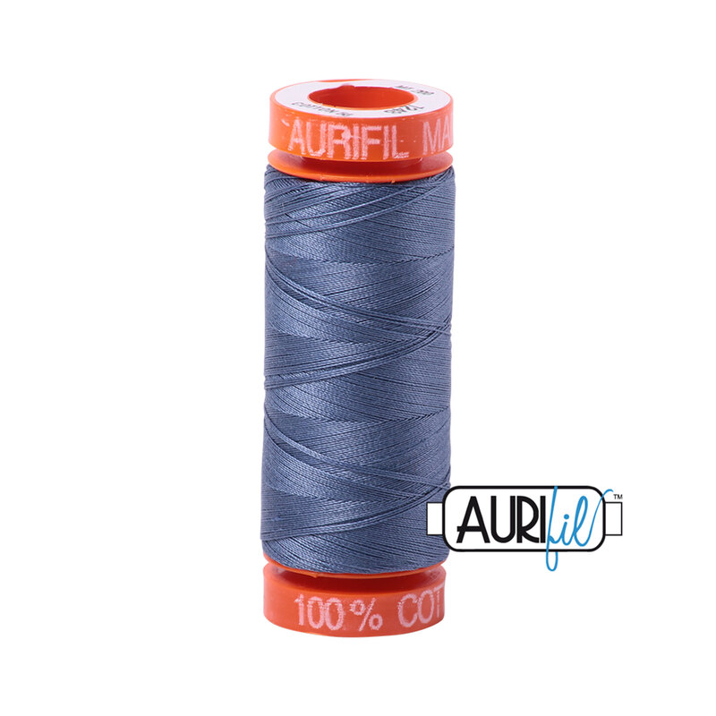 Gray Blue thread on an orange spool, isolated on a white background
