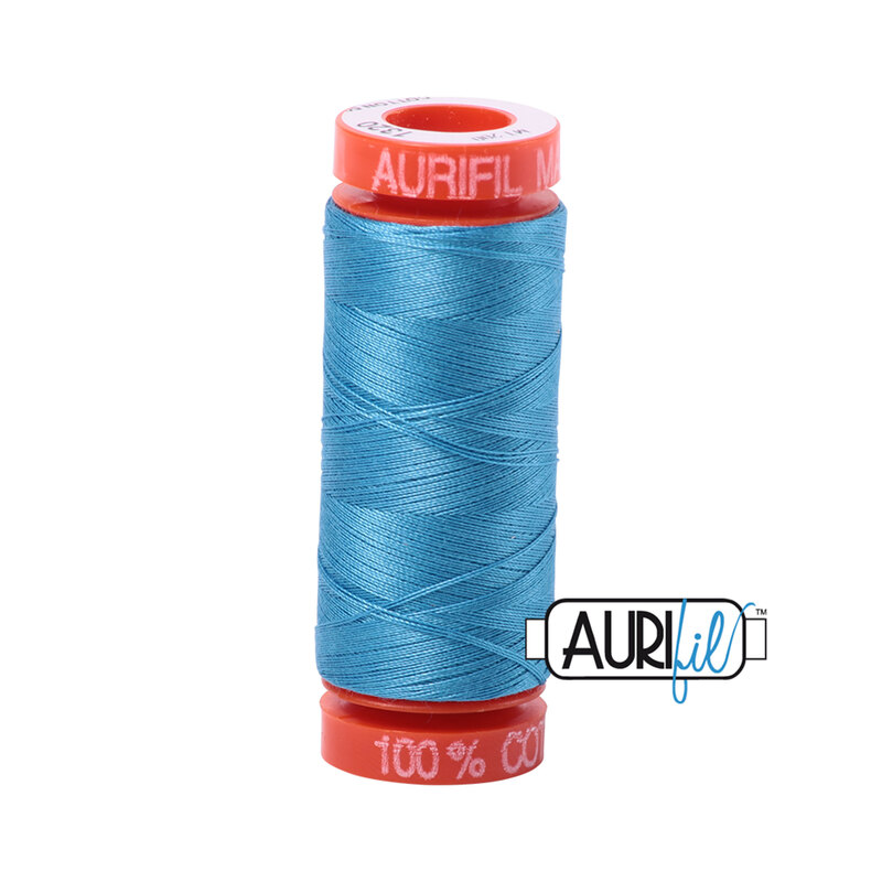 Bright Teal thread on an orange spool, isolated on a white background