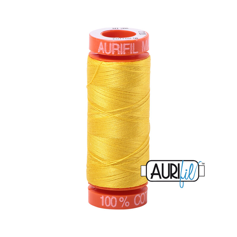 Canary thread on an orange spool, isolated on a white background