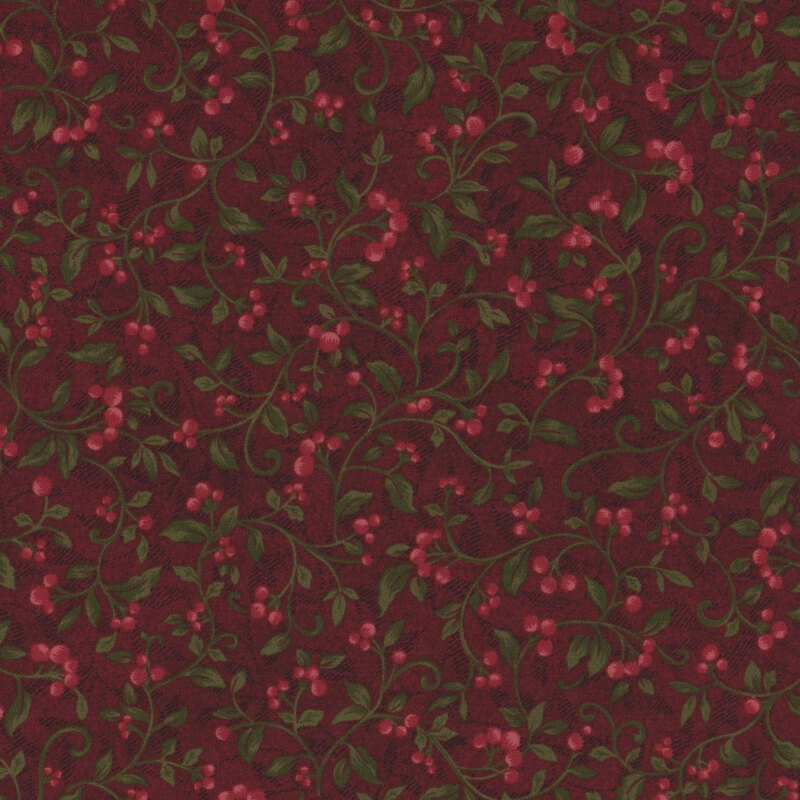 Red fabric with swirly vines with red berries.
