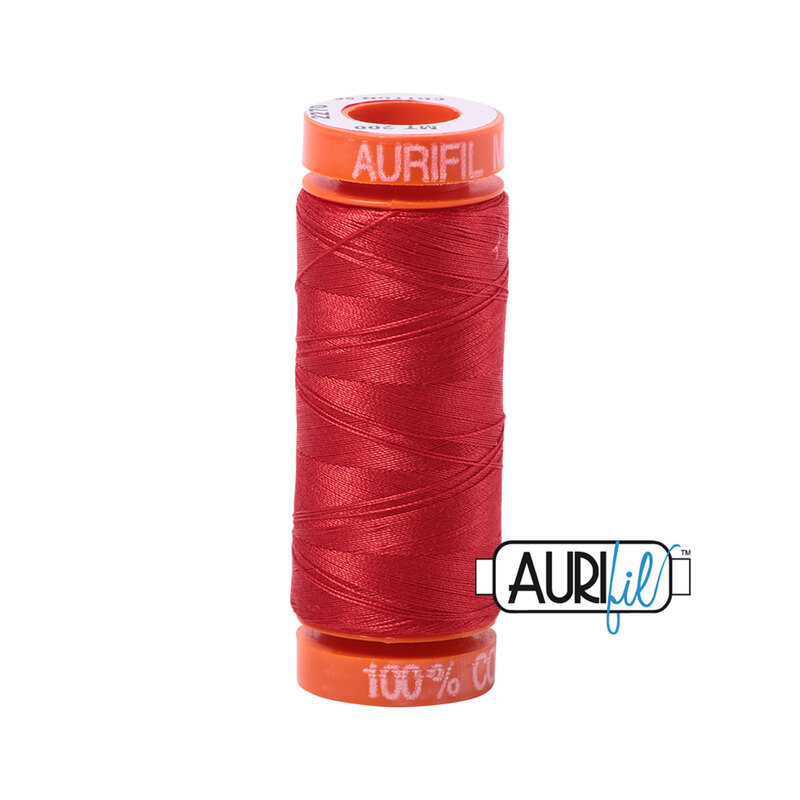 Paprika thread on an orange spool, isolated on a white background