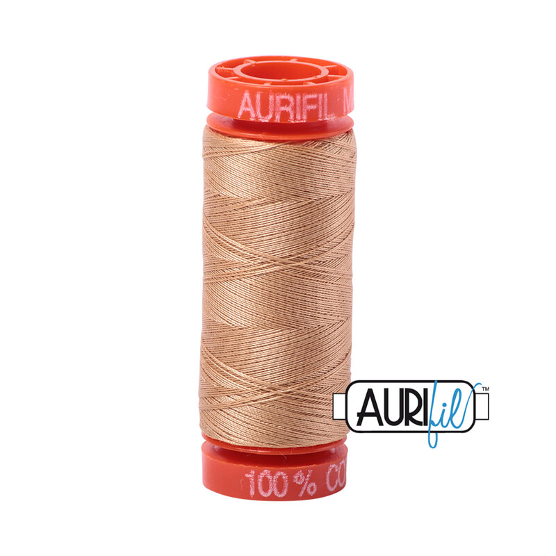 Cachemire thread on an orange spool, isolated on a white background