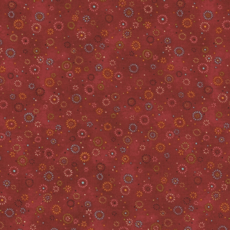 Red mottled fabric with little color bursts.