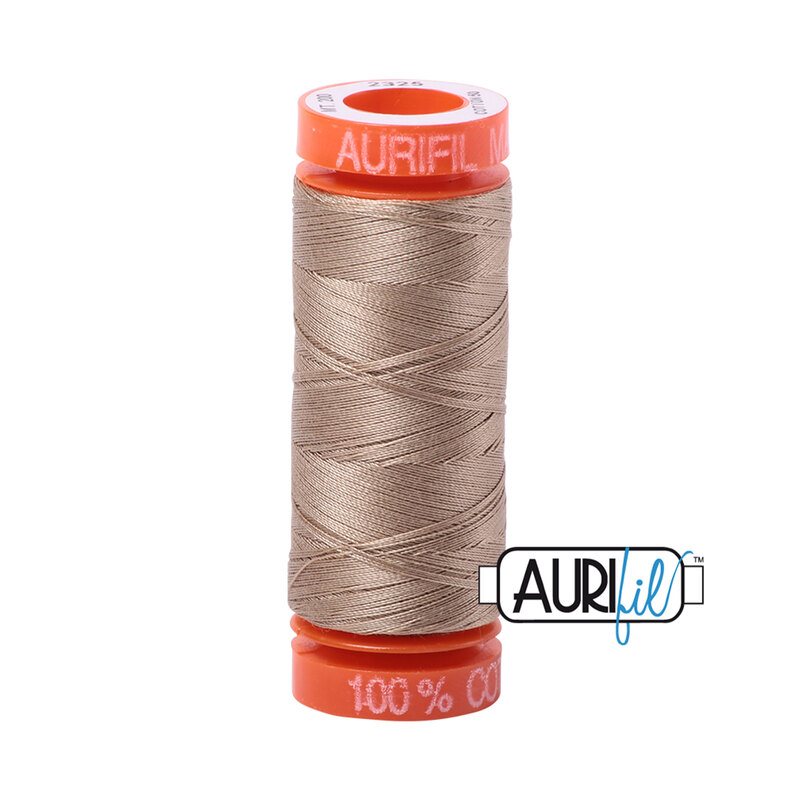 Linen thread on an orange spool, isolated on a white background