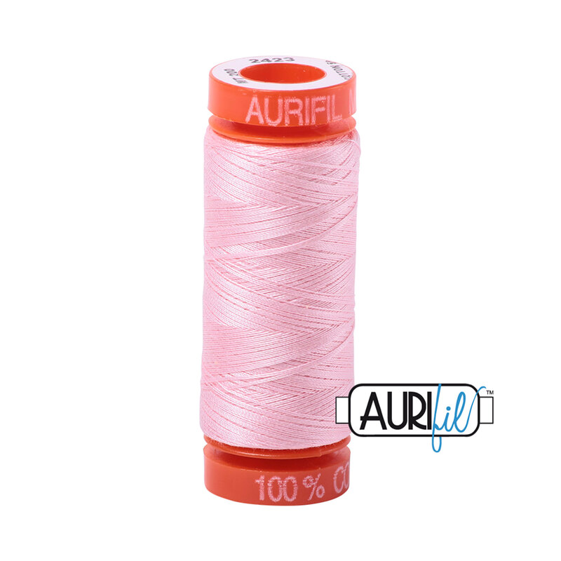 Baby Pink thread on an orange spool, isolated on a white background