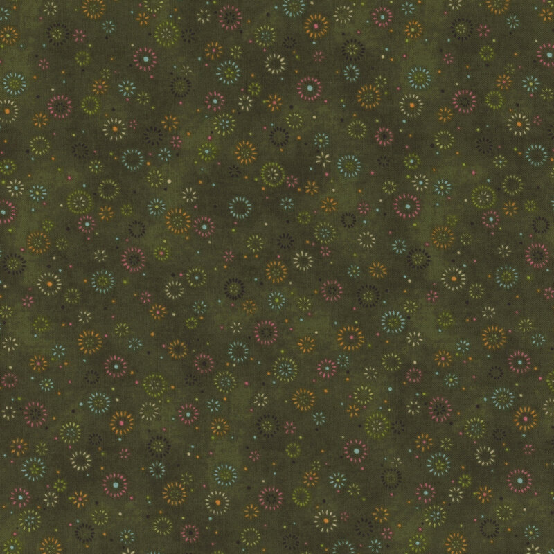 Deep green mottled fabric with little color bursts.