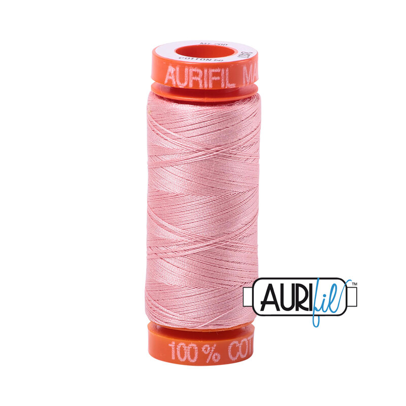 Light Peony thread on an orange spool, isolated on a white background