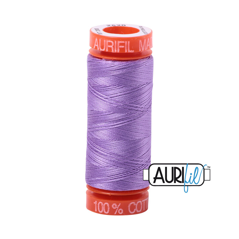Violet thread on an orange spool, isolated on a white background