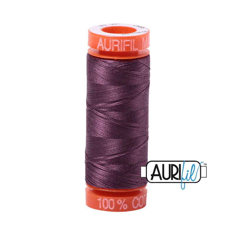 Mulberry thread on an orange spool, isolated on a white background