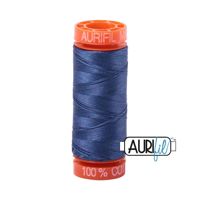 Steel Blue thread on an orange spool, isolated on a white background
