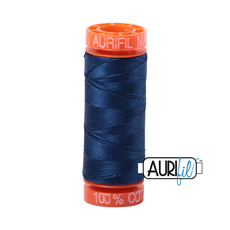 Medium Delft Blue thread on an orange spool, isolated on a white background