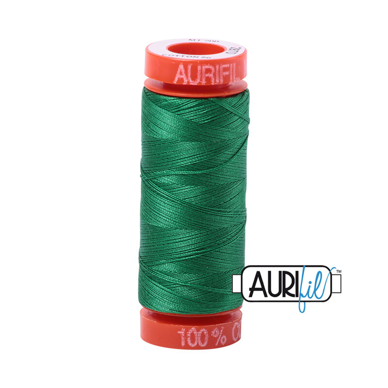 Green thread on an orange spool, isolated on a white background