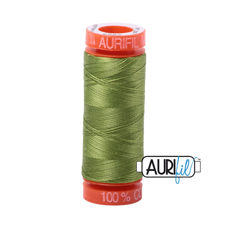 Fern Green thread on an orange spool, isolated on a white background