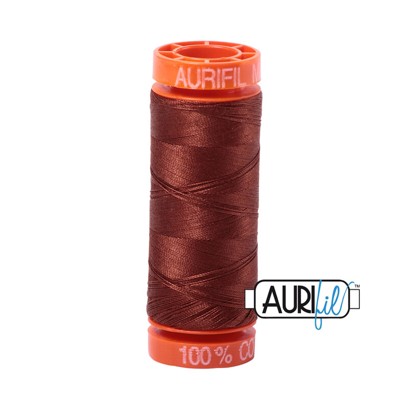 Copper Brown thread on an orange spool, isolated on a white background