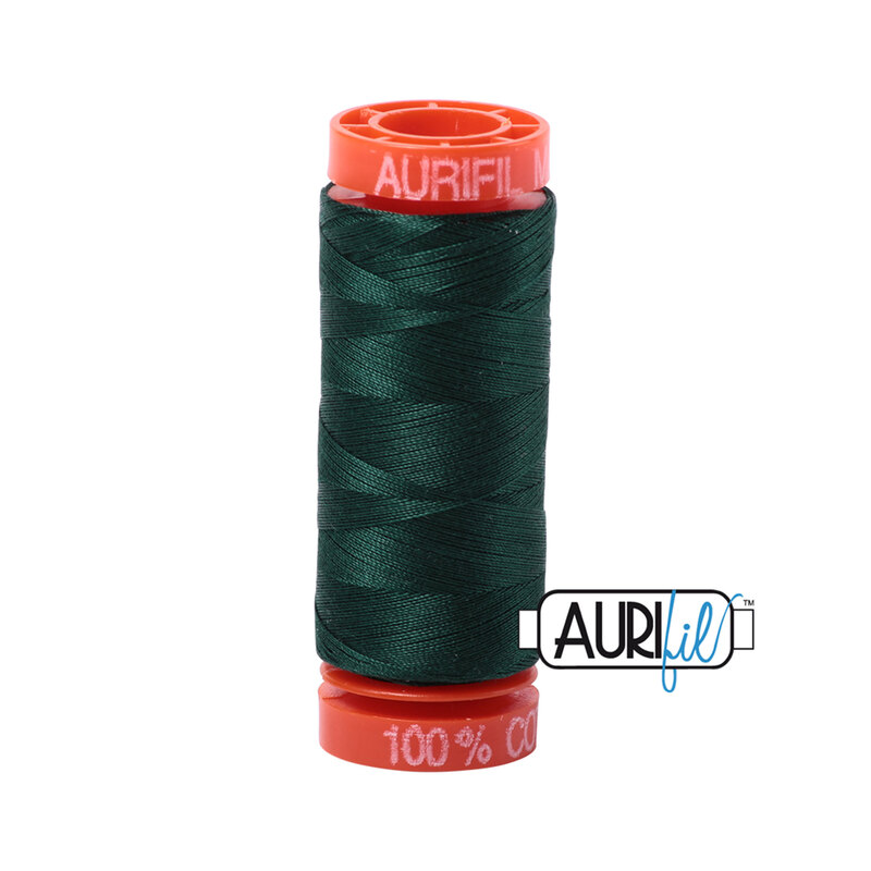 Forest Green thread on an orange spool, isolated on a white background