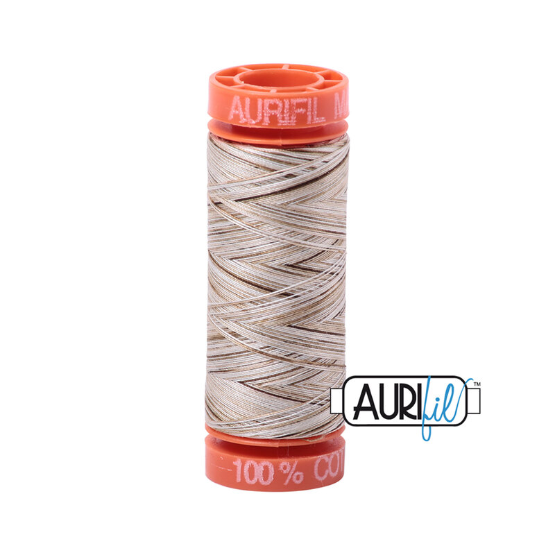Nutty Nougat thread on an orange spool, isolated on a white background
