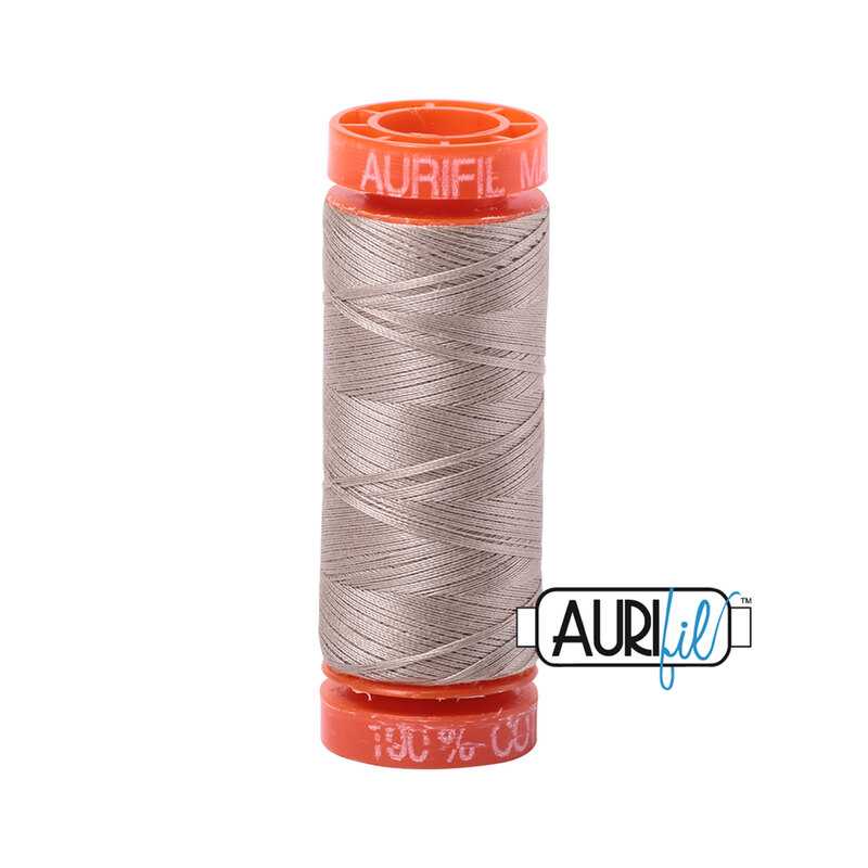 Rope Beige thread on an orange spool, isolated on a white background