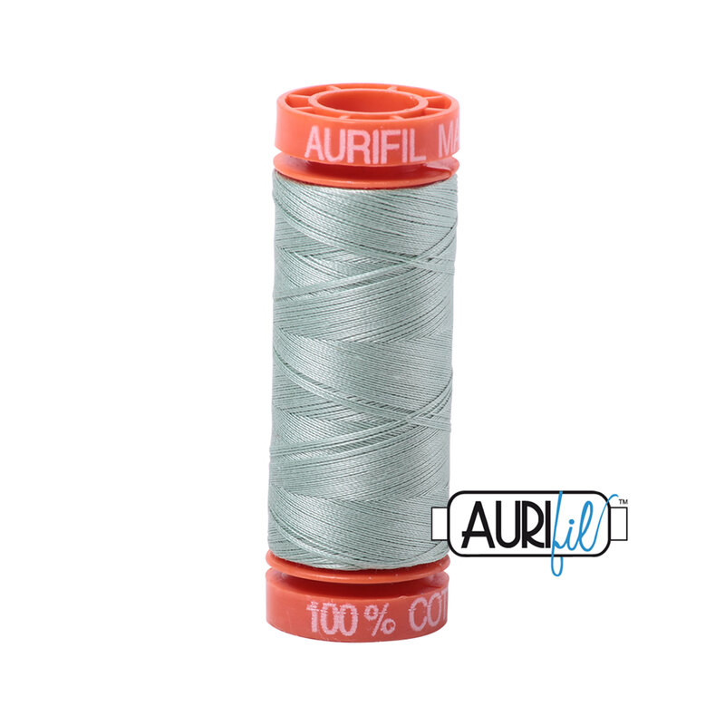 Marine Water thread on an orange spool, isolated on a white background