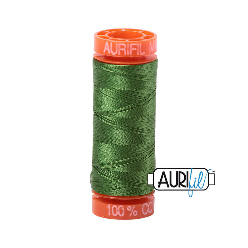 Dark Grass Green thread on an orange spool, isolated on a white background