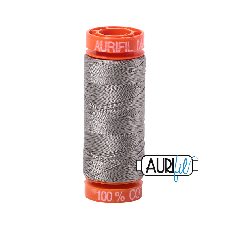 Earl Gray thread on an orange spool, isolated on a white background