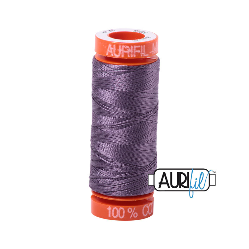 Plumtastic thread on an orange spool, isolated on a white background