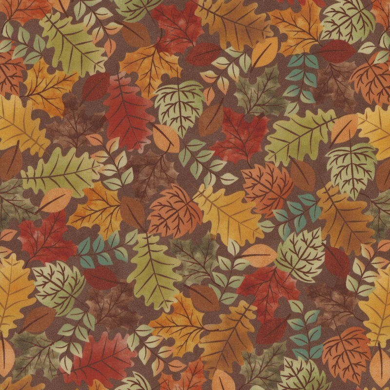 fabric featuring colored leaves on a brown background