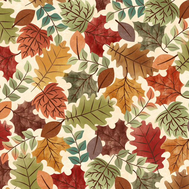 fabric featuring colored leaves on a cream background