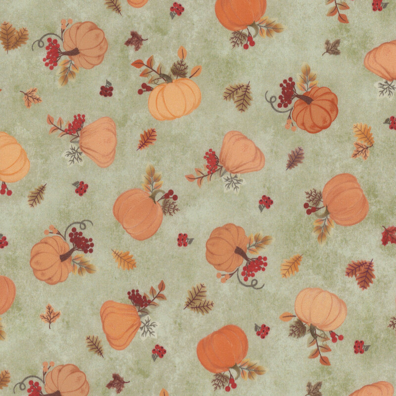 Light sage green fabric featuring tossed pumpkins and leaves