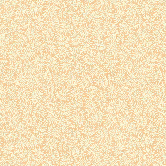 fabric featuring leaves on a cream background