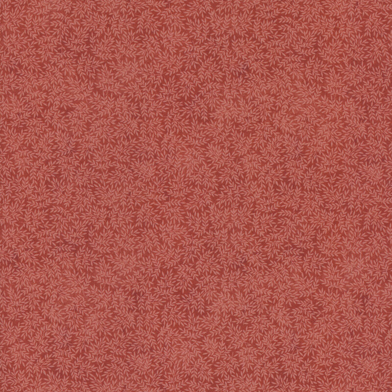 red fabric featuring leaves