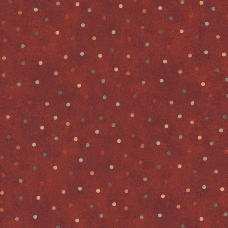 mottled red fabric featuring colored polka dots