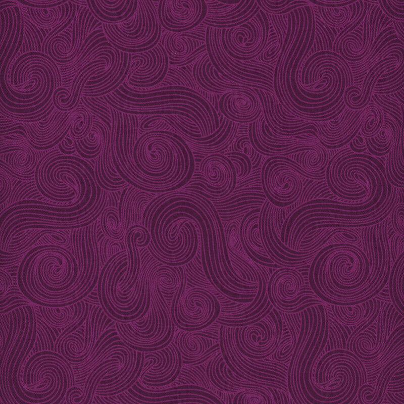 Tonal dark magenta purple fabric featuring swirls and scrolls