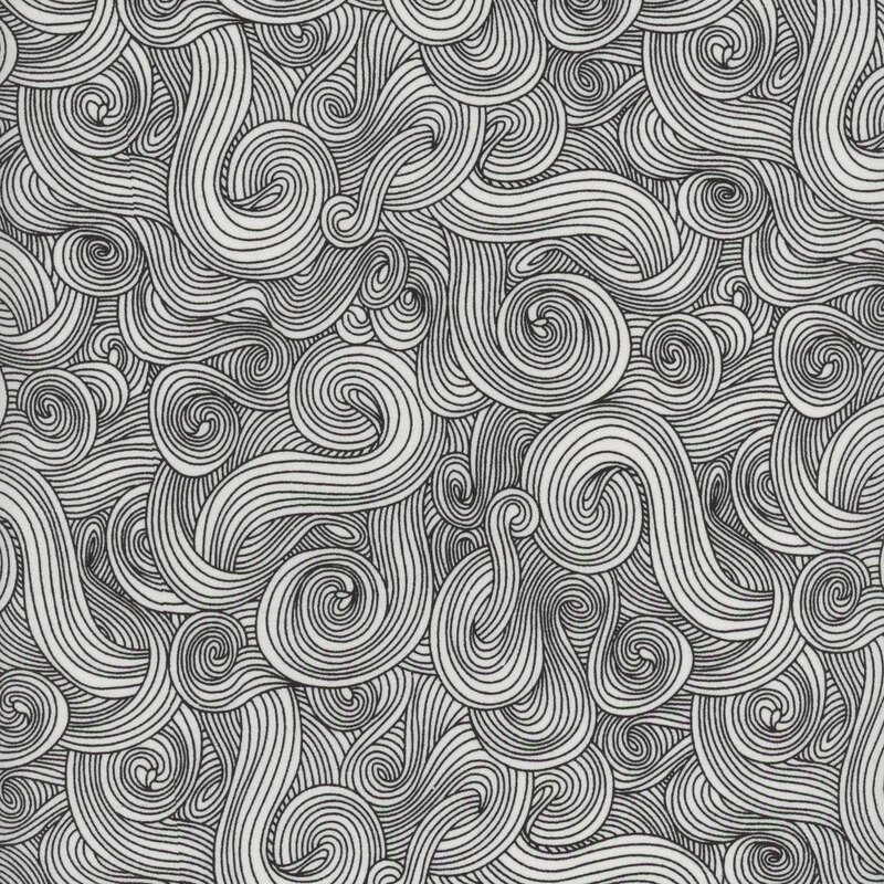 Scan of fabric with a black swirling motif on a white fabric