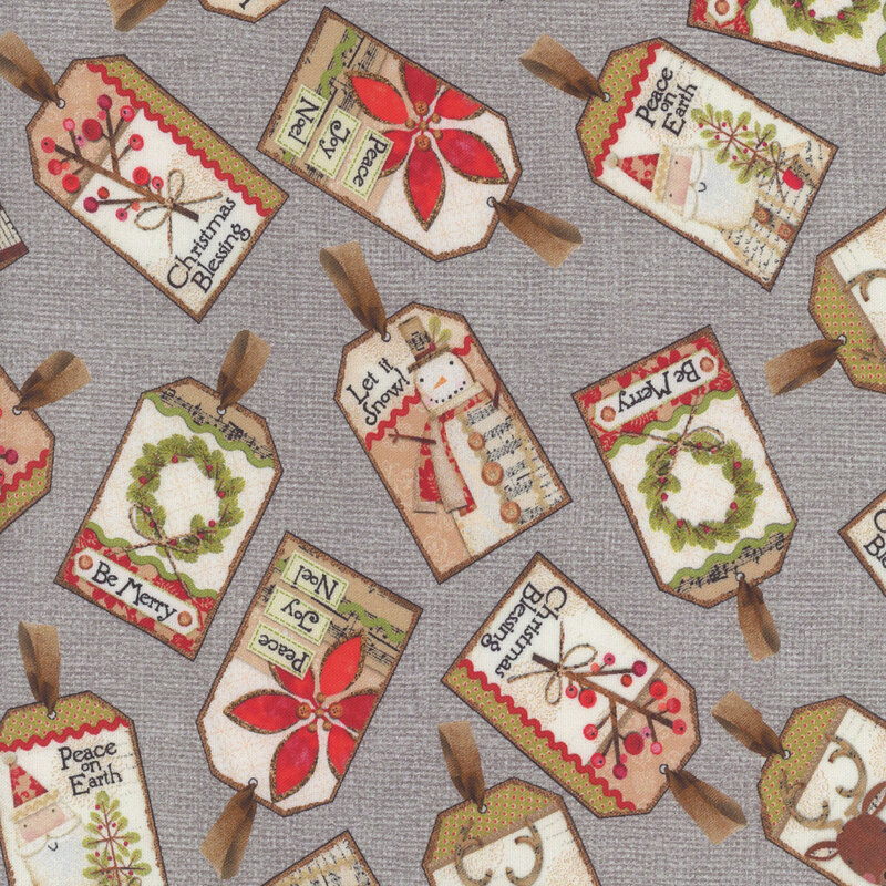 fabric featuring gift tags on on a gray textured background