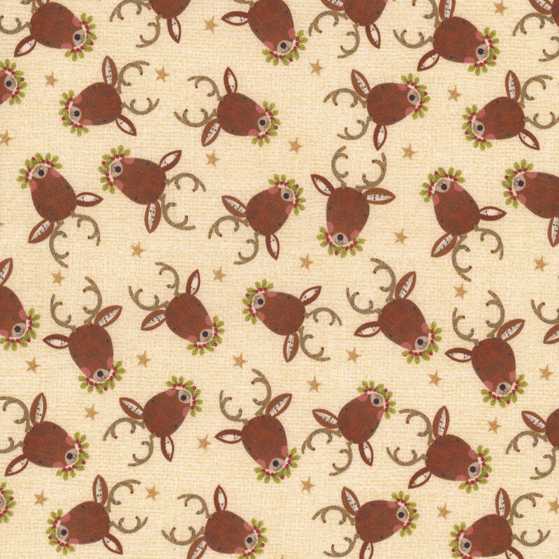fabric featuring reindeer on a cream background