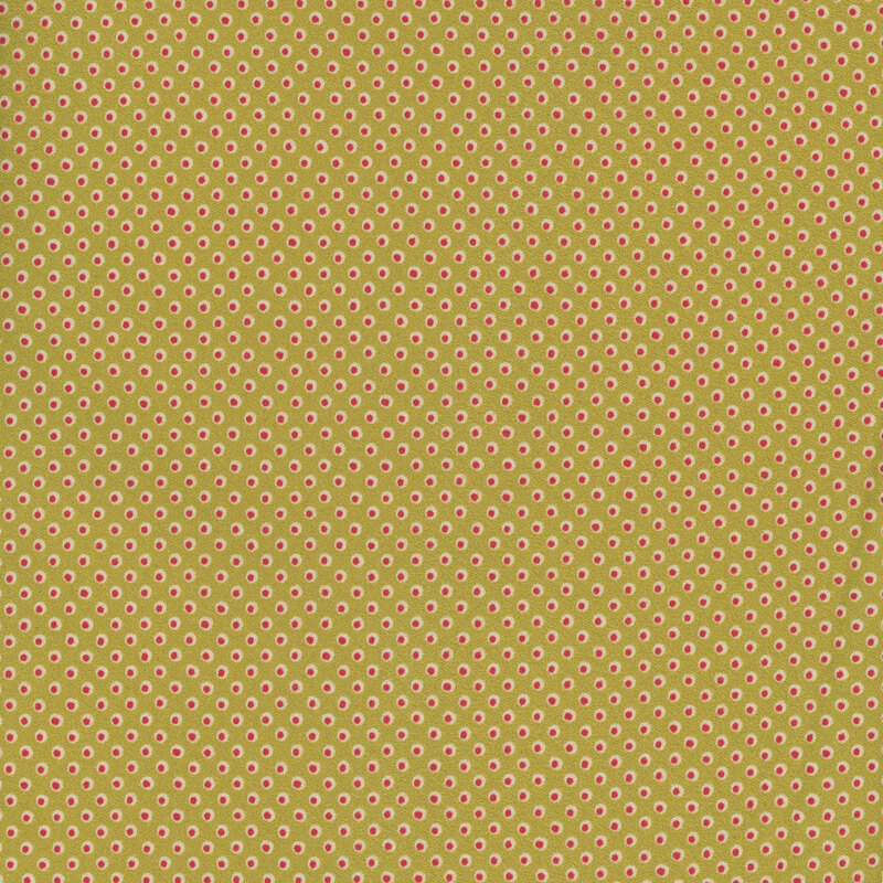 green fabric featuring a white and red dotted design