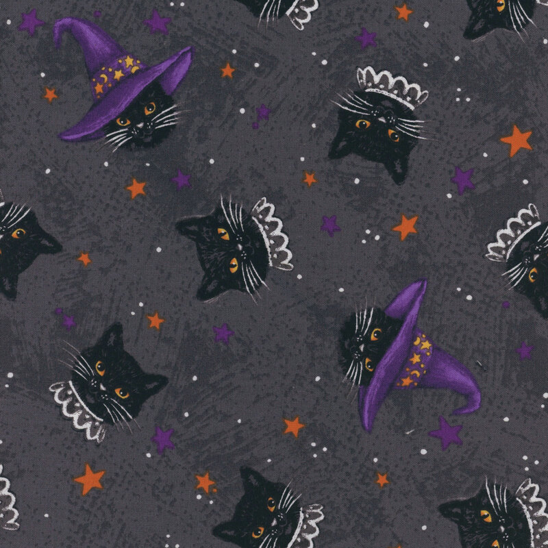fabric featuring bewitched black cats and stars on a gray background
