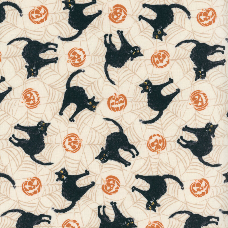 cream fabric featuring black cats and jack o'lanterns on a spiderwebbed background