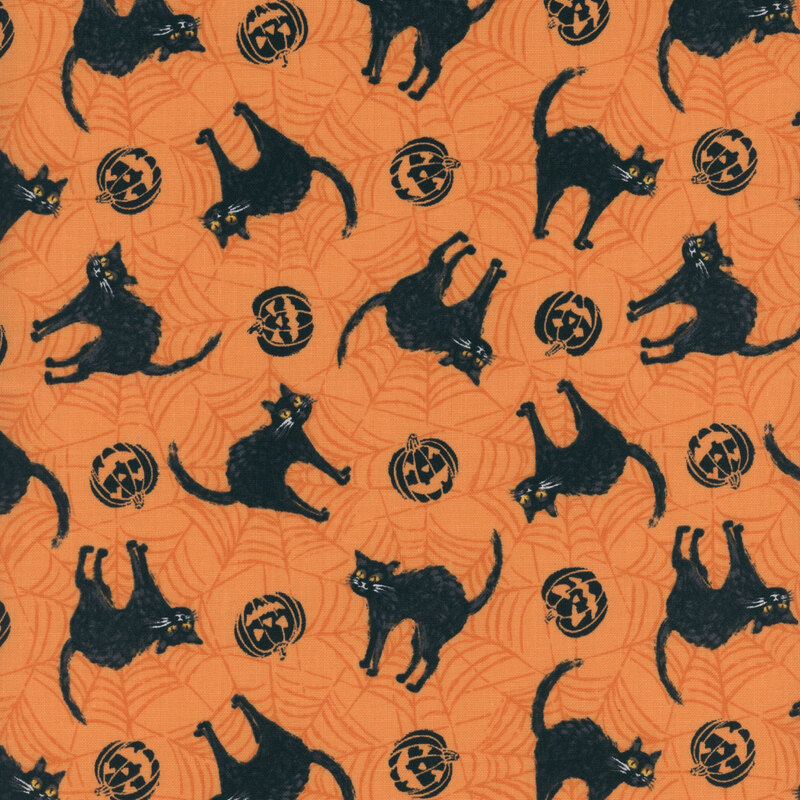 orange fabric featuring black cats and jack o'lanterns on a spiderwebbed background