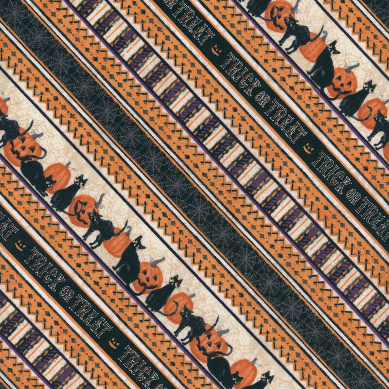 Striped fabric featuring cats and pumpkins in black, orange, and cream