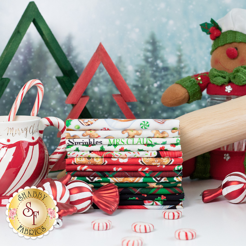 Festive fabric bundles with holiday patterns, a rolling pin, and candy canes, beside a cheerful gingerbread figure.