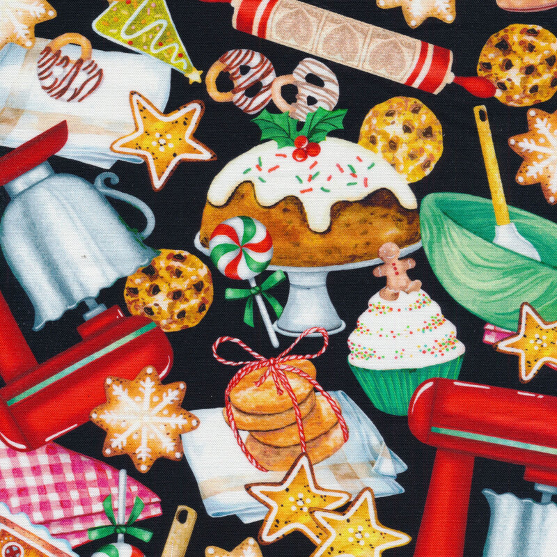 Black fabric with a pattern of cookies, cupcakes, gingerbread houses, and kitchen things.