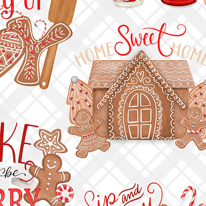 white fabric featuring gingerbread houses, cookies, hot cocoa and cozy phrases