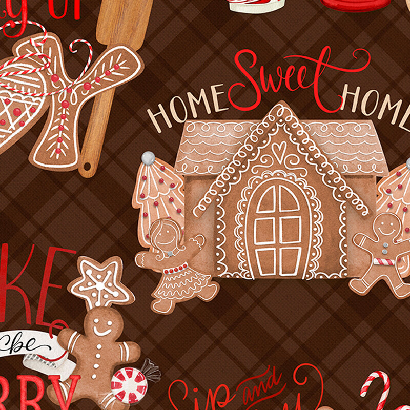 brown fabric featuring gingerbread houses, cookies, hot cocoa and cozy phrases