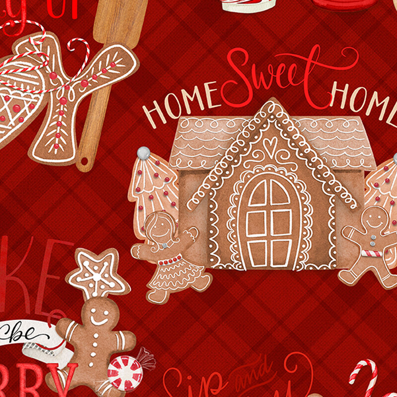 red fabric featuring gingerbread houses, cookies, hot cocoa and cozy phrases