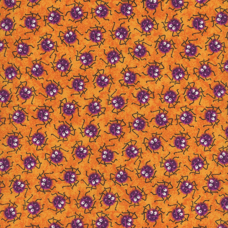 textured orange fabric, featuring scattered fuzzy purple spiders