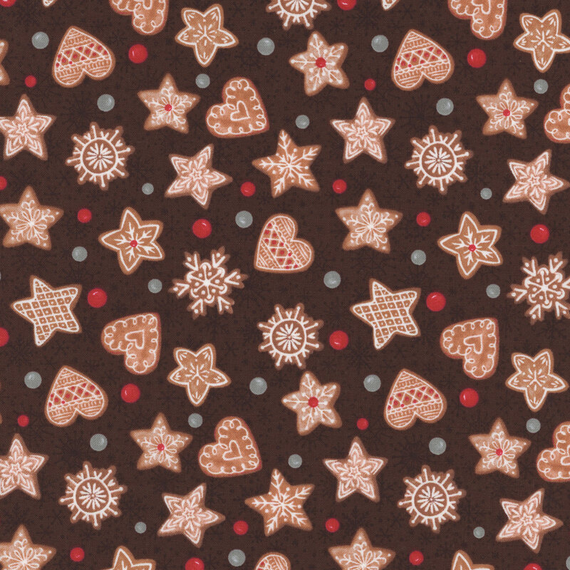 brown fabric featuring decorated gingerbread cookies