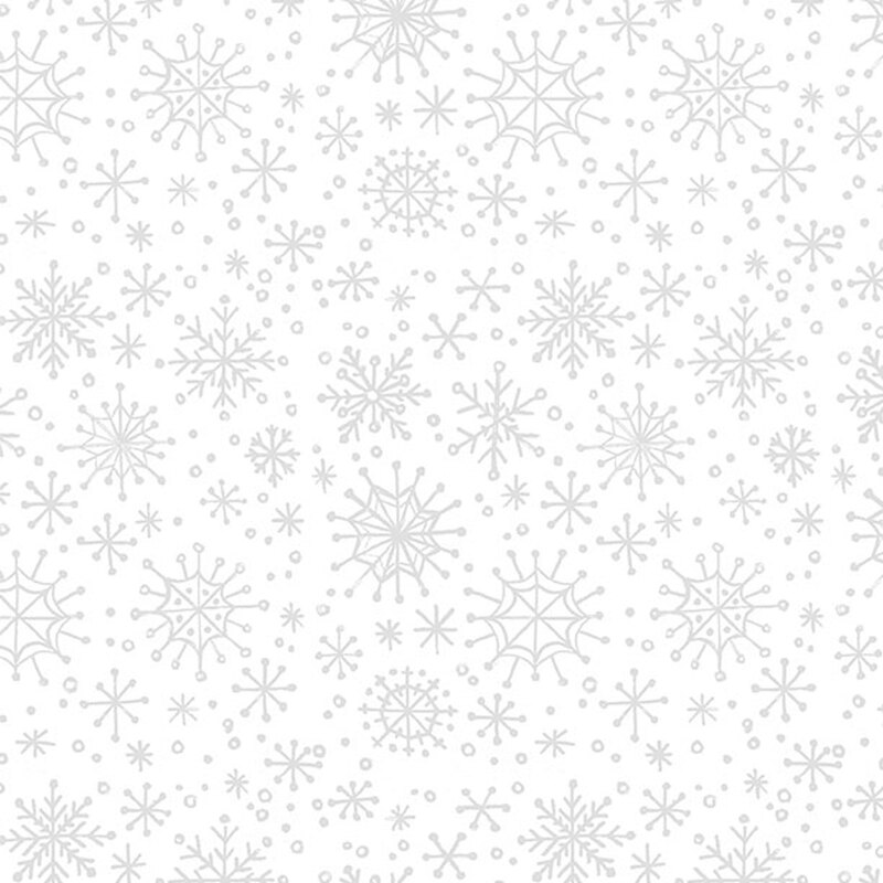 white fabric featuring silver snowflakes